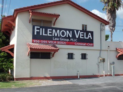 Building sign — Filemon Vela Law Group